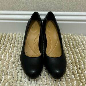 Black pumps by Clarks